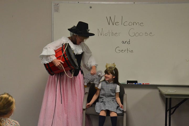 Mother Goose had Audrey Cogan of the St. Mary of the Lakes School act out the role of “Queen of England” during her presentation to the kindergarten and pre-kindergarten classes on Monday, Nov. 14.