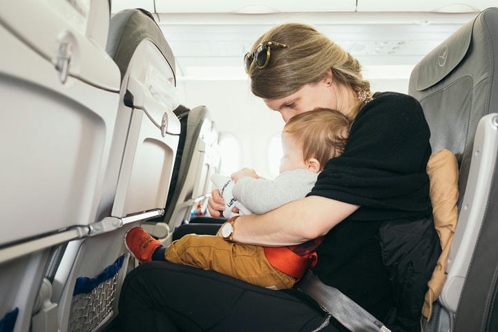 Mother and baby on a plane