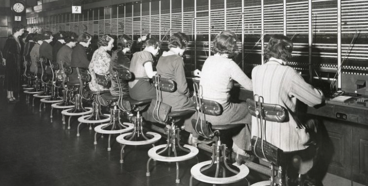 Women working at an antique switchboard. Photo credit: Shutterstock