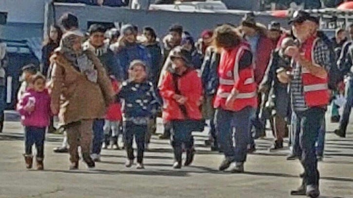 A group of Syrians who have just arrived at the refugee camp. 