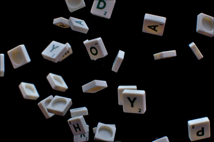 Scrabble bricks floating