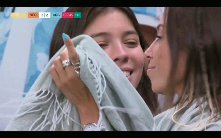 photo of two now happy female Argentinian fans