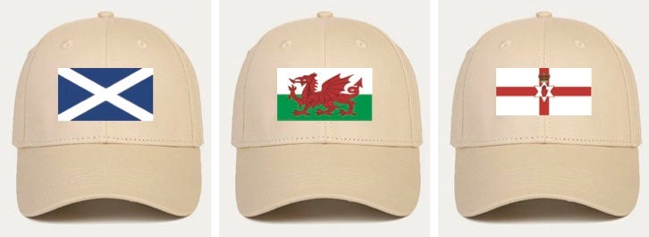 photo of 3 baseball caps, one with a Scotland flag, one with a Welsh flag and one with a Northern Irish flag on it