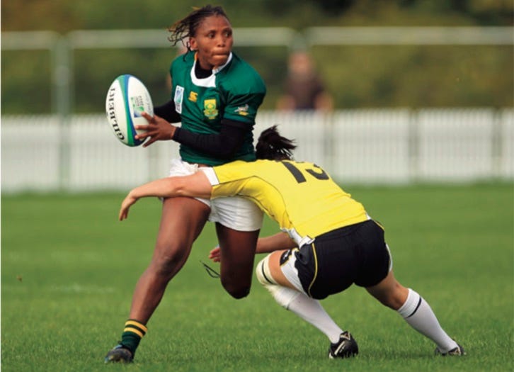 photo rugby player tackling another rugby player