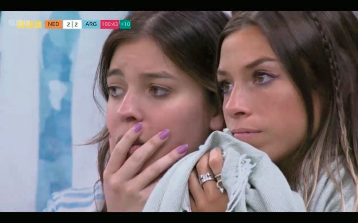 photo of two sad female Argentinian fans