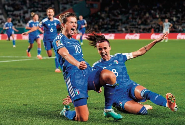 photo of Italy players celebrating scoring a goal