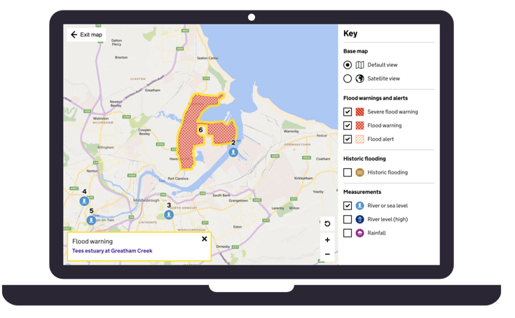 Image of a laptop showing the Flood Information Service Private Beta.
