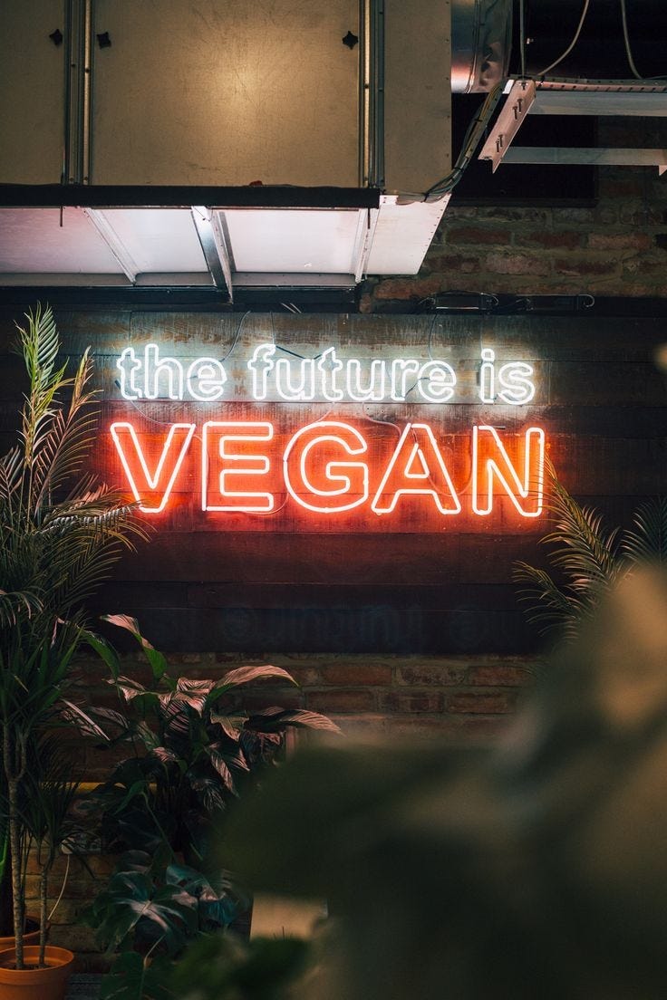 A billboard with the sign ‘the future is vegan’