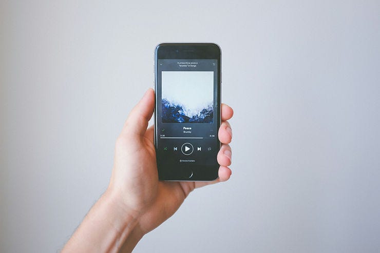 A phone open to a Music Streaming Platform