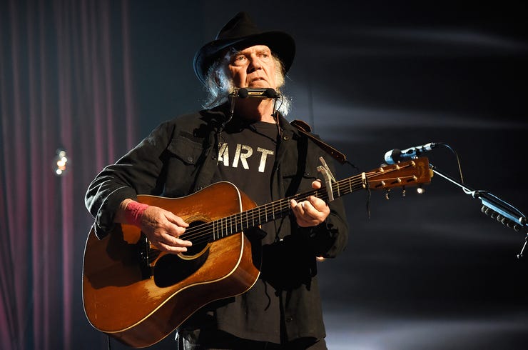 Neil young performs musicares 2015 billboard 650 1548