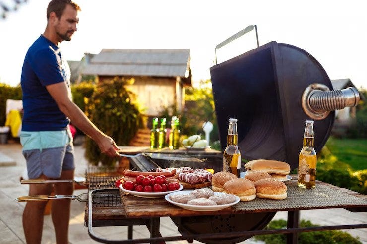 outdoor dining table with bbq grill