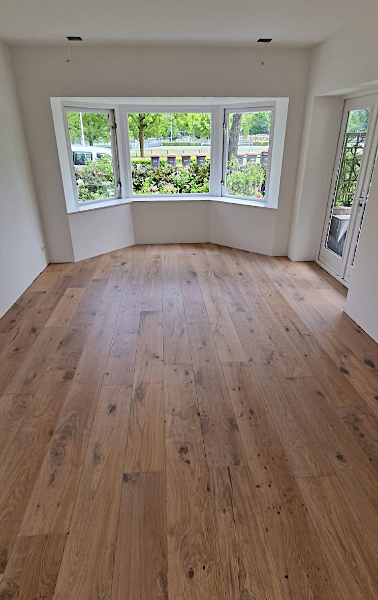 A rustic oak wood floor