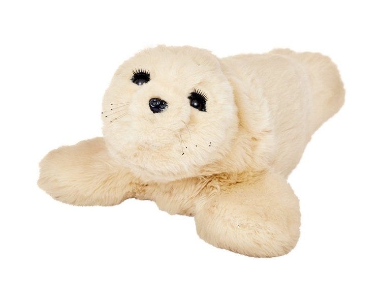 Paro, a robot seal, with white fluffy coverage