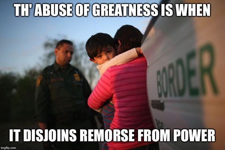 Image of a woman embracing her child while a CBP agent looks on