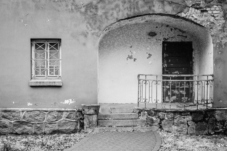 black and white old building modivation