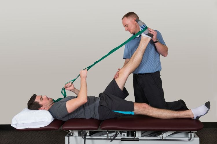 Hamstring Stretch exercise using a stretch band