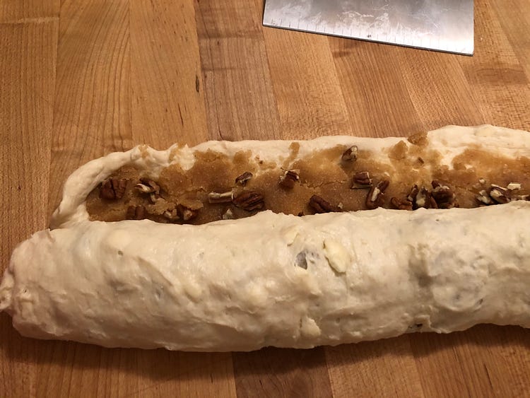 Roll up the cinnamon rolls into a log.