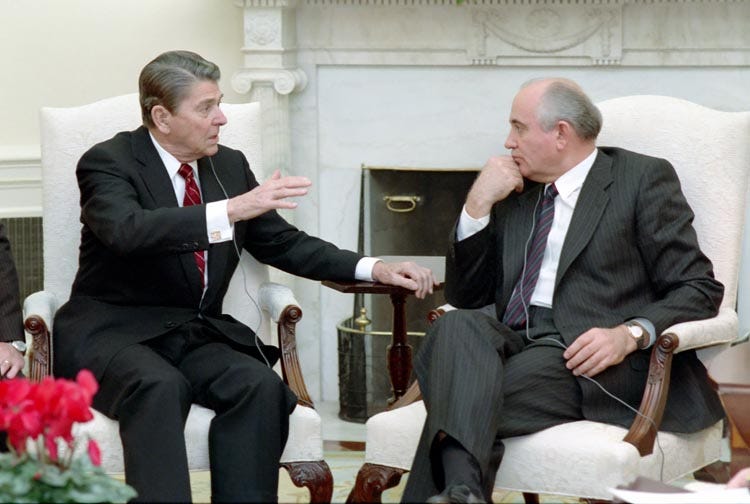 Ronald Reagan and Mikhail Gorbachev speak in the White House.