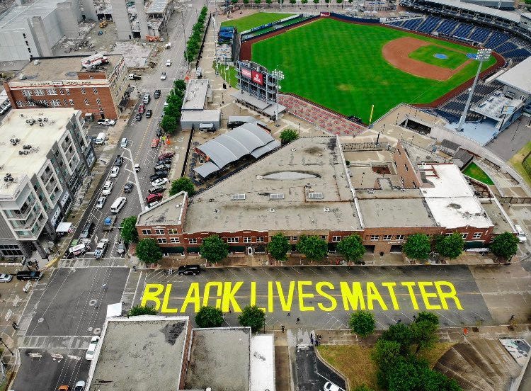 Black Lives Matter painted in yellow on streets of Tulsa