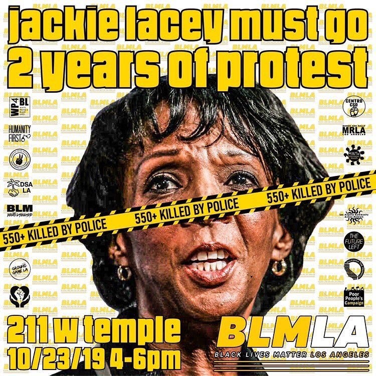 A poster for protests against LA County DA Jackie Lacey, text says “Jackie Lacey must go, 2 years of protest.”