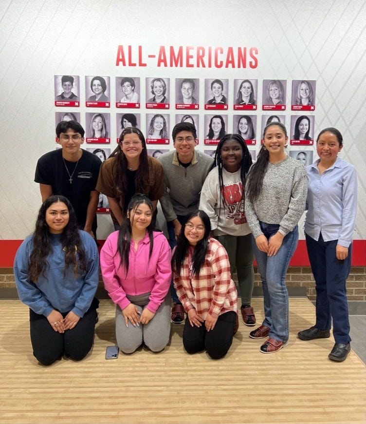 FTOC members smile for a photo before bowling on East Campus