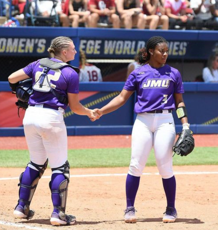 On the left, Lauren Bernett, #22, and Odicci Alexander, #3, on the left in the Women’s College World Series 2021.