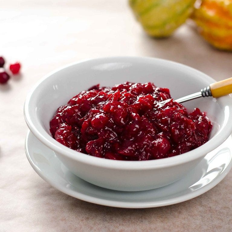 white bowl of cranberry sauce