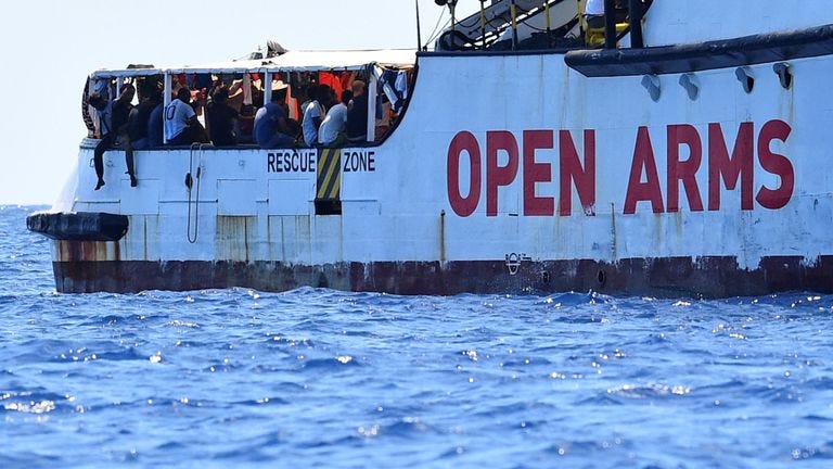 'Many tears' as Italy lets stranded minors disembark rescue ship