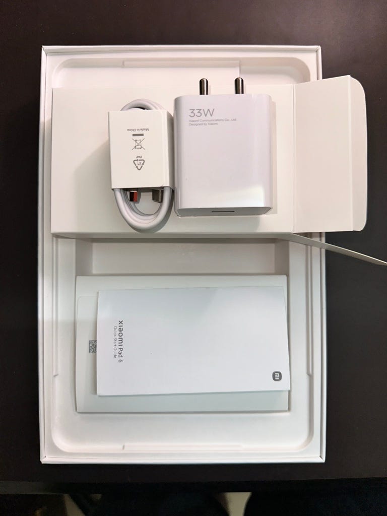 Pad 6 package contents with 33W fast charger, USB-A to USB-C cable and paperwork