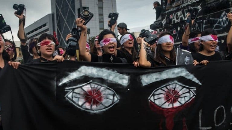 2019 Chileian  Activists protests the police’s targeting of protesters’ eyes with rubber bullets (Photo credit: Nicole Kramm)