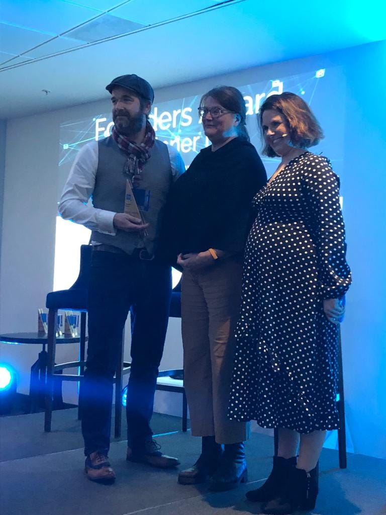 Photograph of Dan Sutch, CAST’s Director, receiving the Digital Leaders’ Founders Impact Award from Stephanie Burras CBE and BBC presenter and journalist Nina Warhurst.