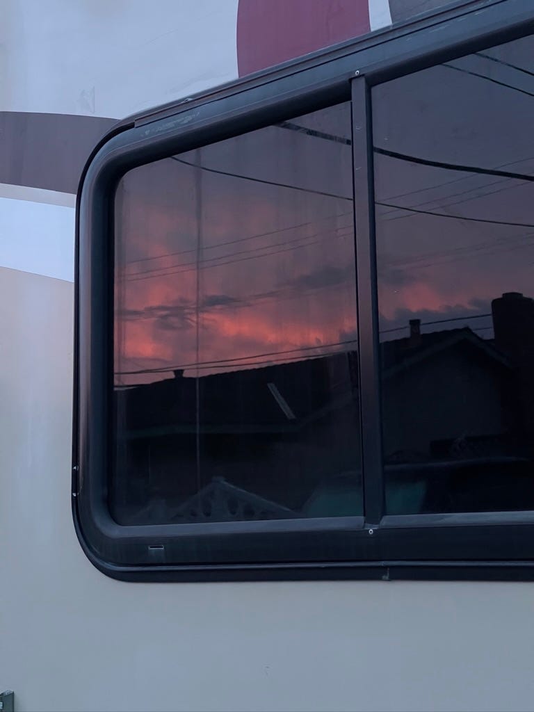 Sunset reflection into our RV window