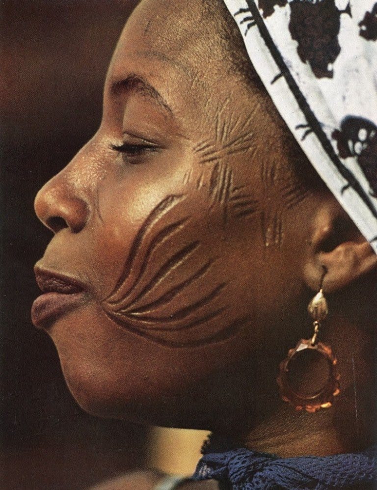 African woman with tribal marks on her face