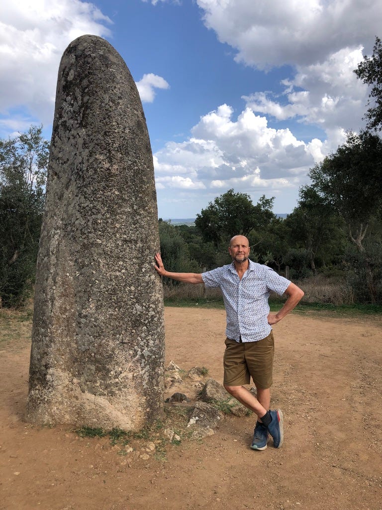 Author and menhir. (Photo credit: Cat Cooper)