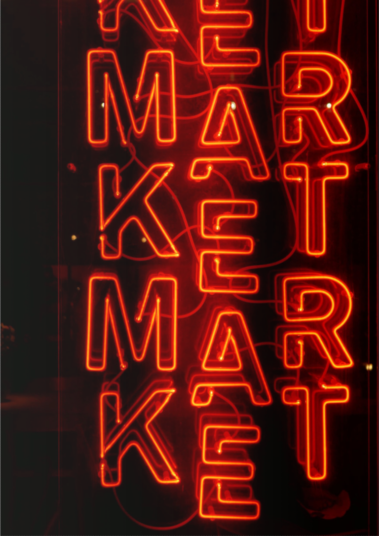 neon sign that says market, market, market