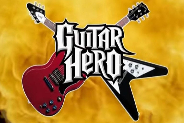 Guitar hero logo with two overlapping guitars