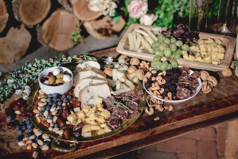 A delicious spread on a grazing table at a catered event.