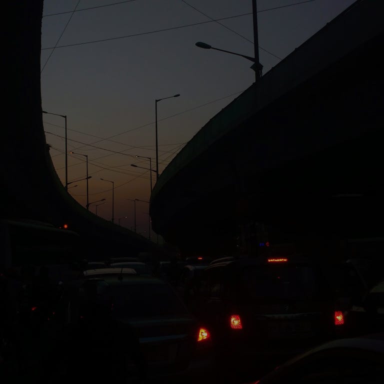 late evening traffic jam under a flyover