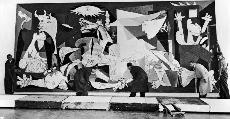 Picasso’s Guernica being hung in Amsterdam’s Municipal Museum, 1956