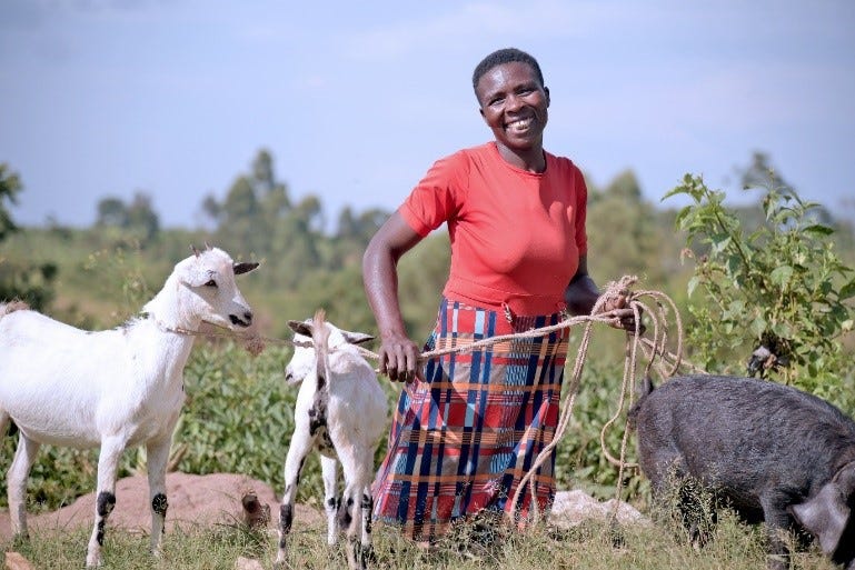 A Graduating to Resilience participant with her livestock she manages as a business. (Photo: AVSI Foundation)