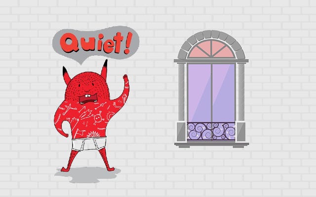 A cartoonish devil in his underwear saying “Quiet!” plastered over a rustic house wall