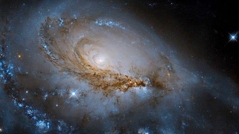 Hubble captures spiral arms of a galaxy filled with young suns