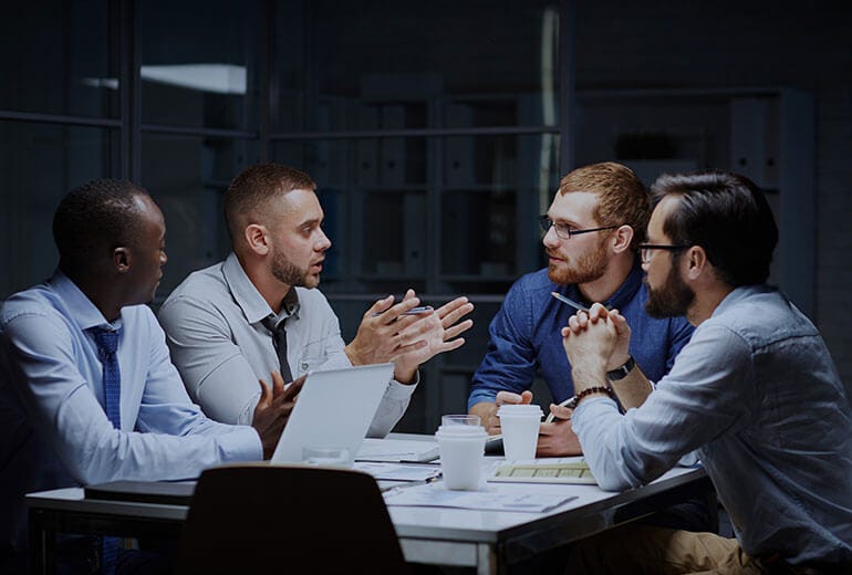 Insurance Agency Meeting with Four Agents