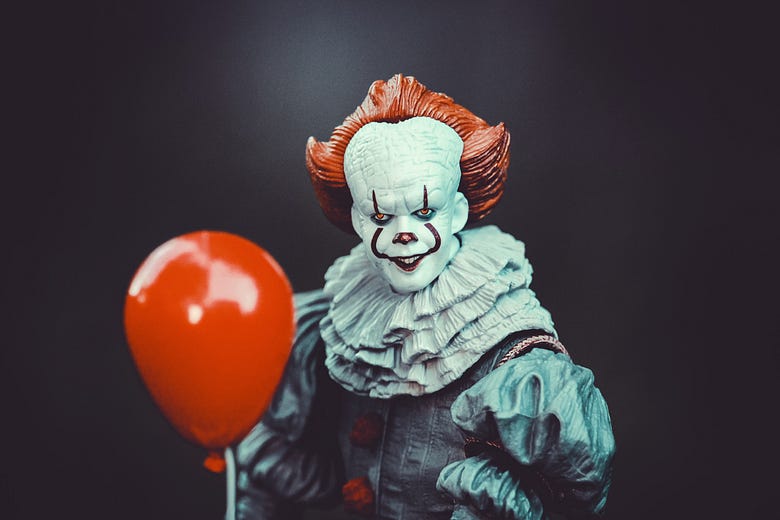 A figurine of the evil clown from the movie IT