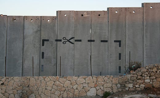 Work by Banksy located on the Israeli West Bank Barrier