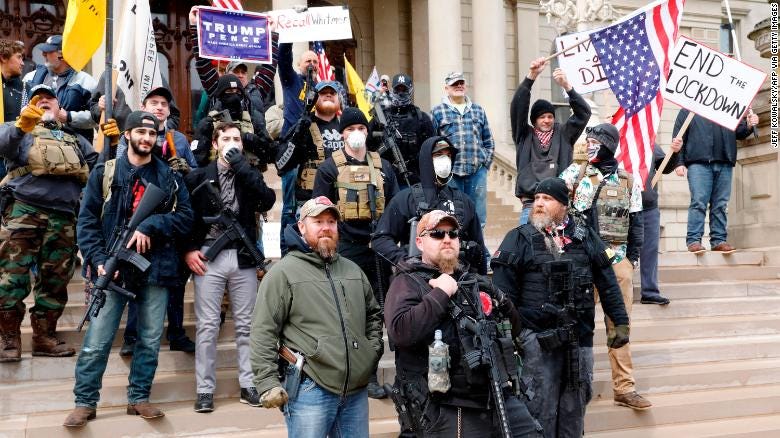 Lansing, Michigan, protesters open carry during protests.