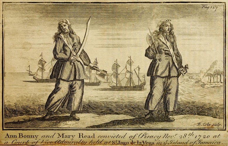 Ann Bonny and Mary Read standing on a beach in a black and white engraving