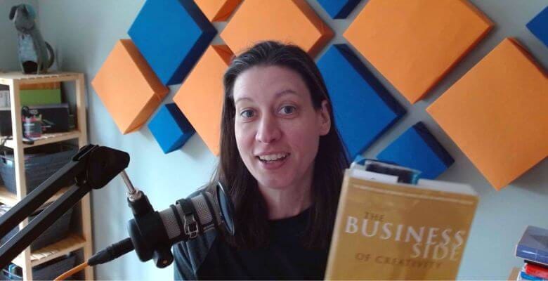 Colleen holding a business book