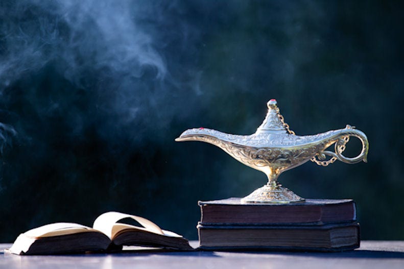 Genie lamp and books.