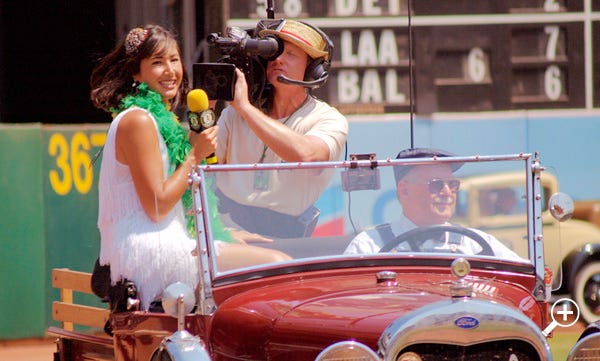 On-field reporting in old-timey cars